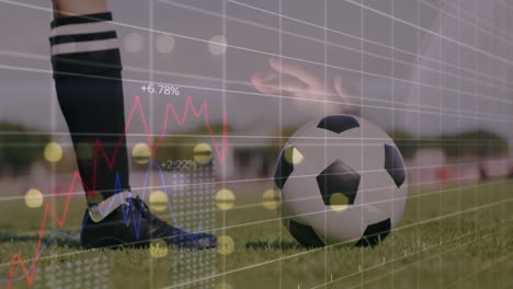 Soccer player preparing to kick ball with financial data animation overlay