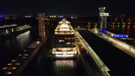 cruise ship docked at night