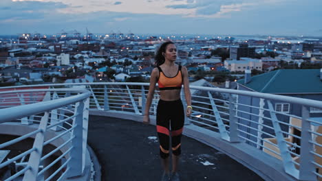 Runner,-black-woman-and-bridge-in-city-with-music