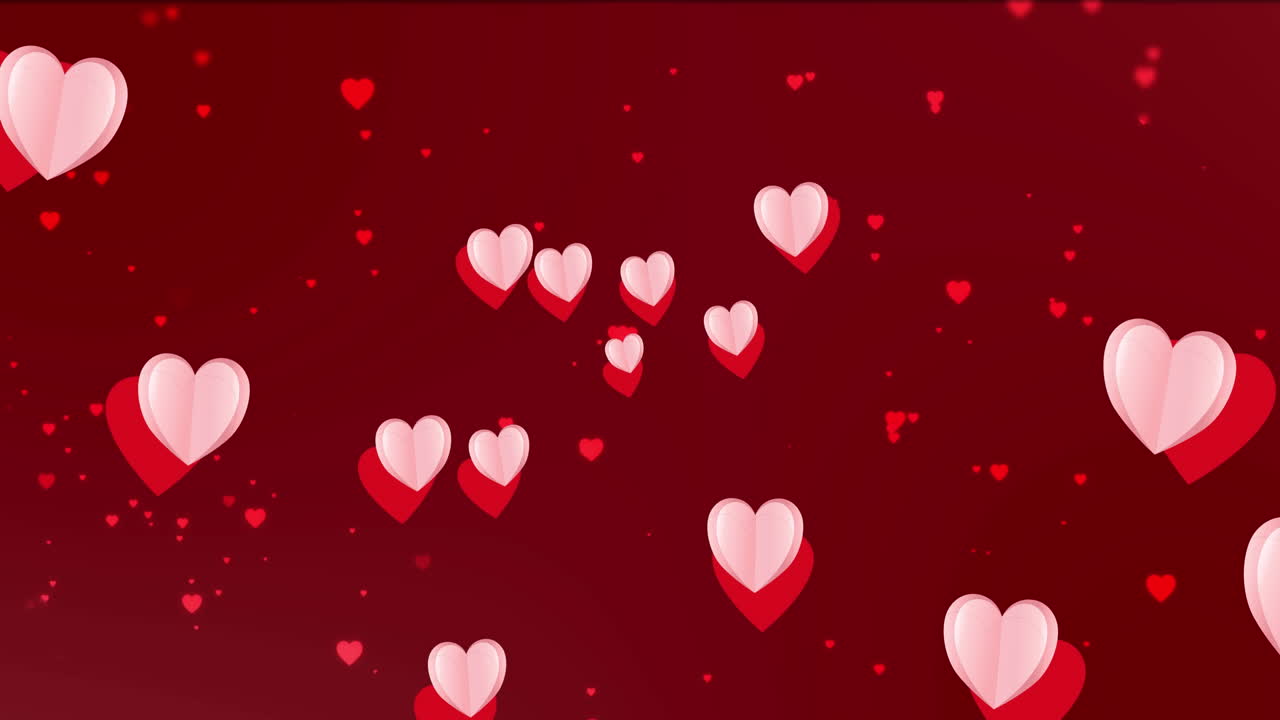 Animazione di cuori rossi e rosa che fluttuano su sfondo rosso.