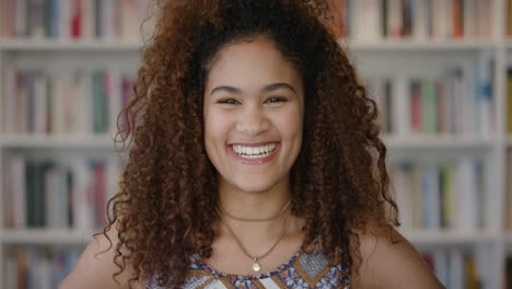 portrait-lively-young-mixed-race-woman-student-laughing-enjoying-education-lifestyle-happy-female-with-frizzy-in-library-bookstore-background