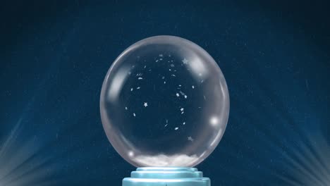 animation of christmas snow globe and snow falling on blue background