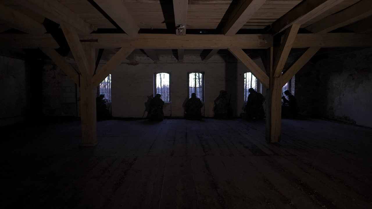 Silhouettes of People in an Abandoned Building