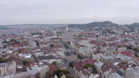 Aerial-Drone-Video-of-European-City-Lviv,-Ukraine,-Rynok-Square,-Central-Town-Hall,-Dominican-Church