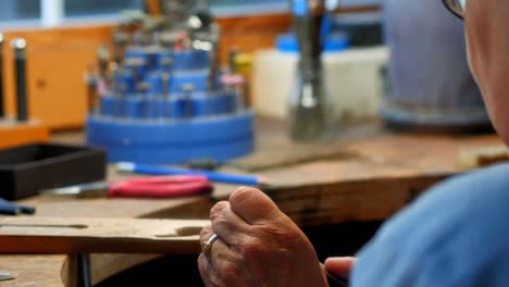 craftswoman working in workshop