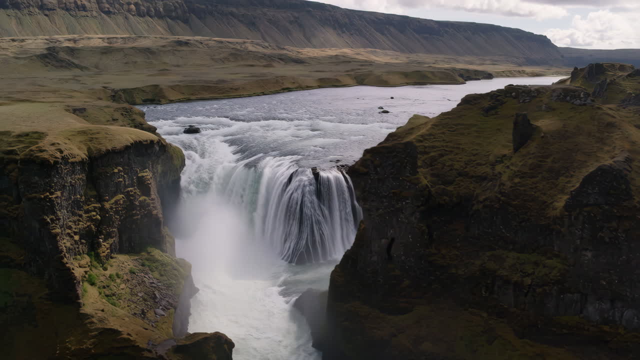 Powerful Waterfall in a Scenic Valley