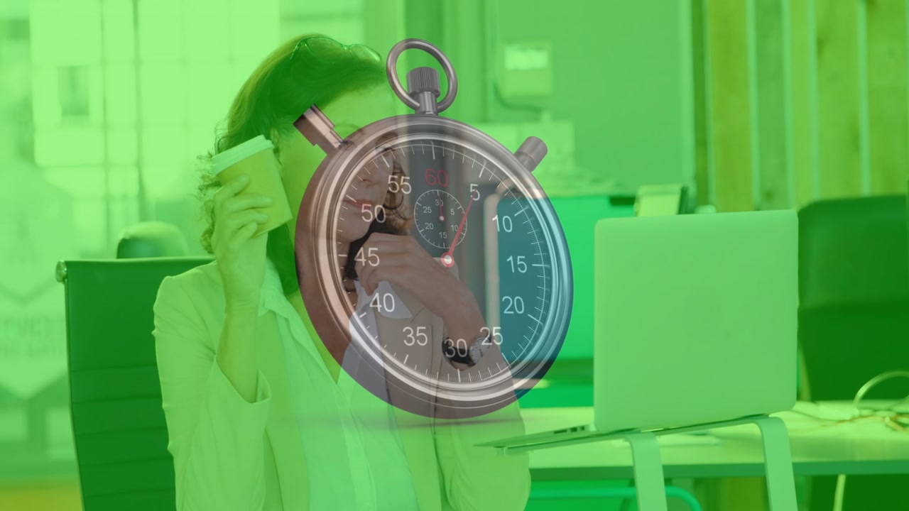 Exec raising hand, lifting cup, using laptop while faint timer over scene timing business meeting