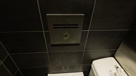 hand flushing toilet in paris restroom