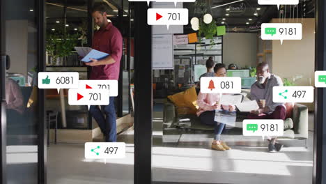 animation of social media notifications over diverse colleagues talking at casual office