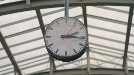 public clock on the train station in 4k