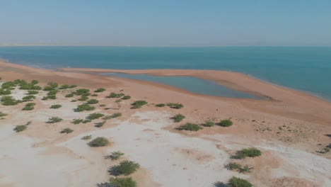 aerial dolly forward towards waters of gulf of oman over jiwani beach