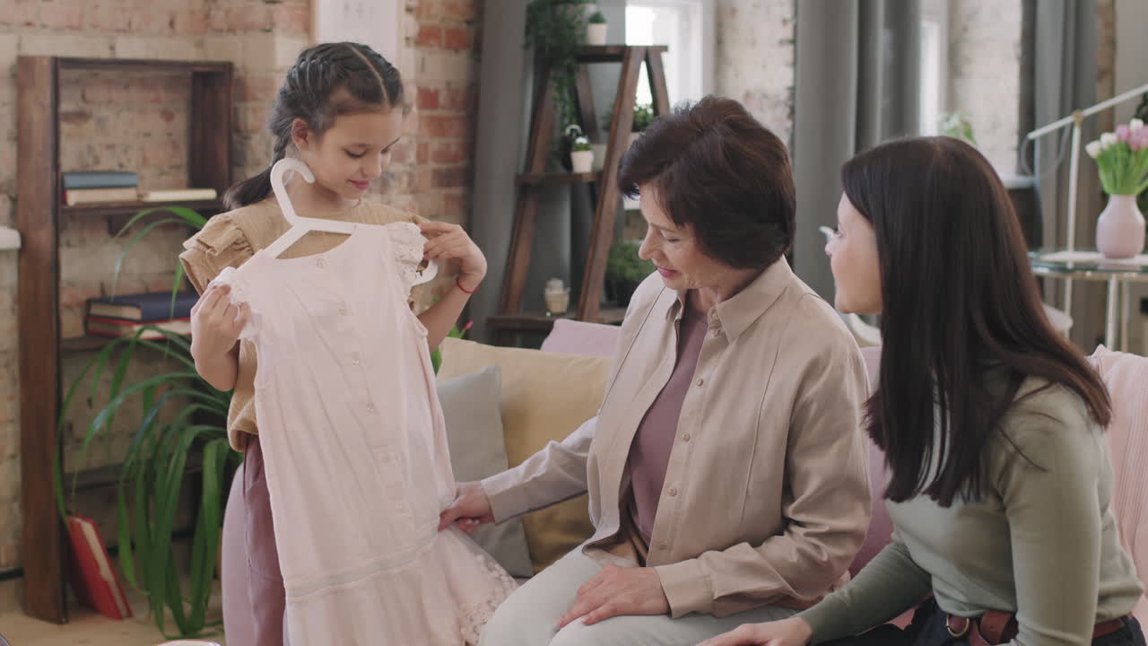 Family looking at a dress