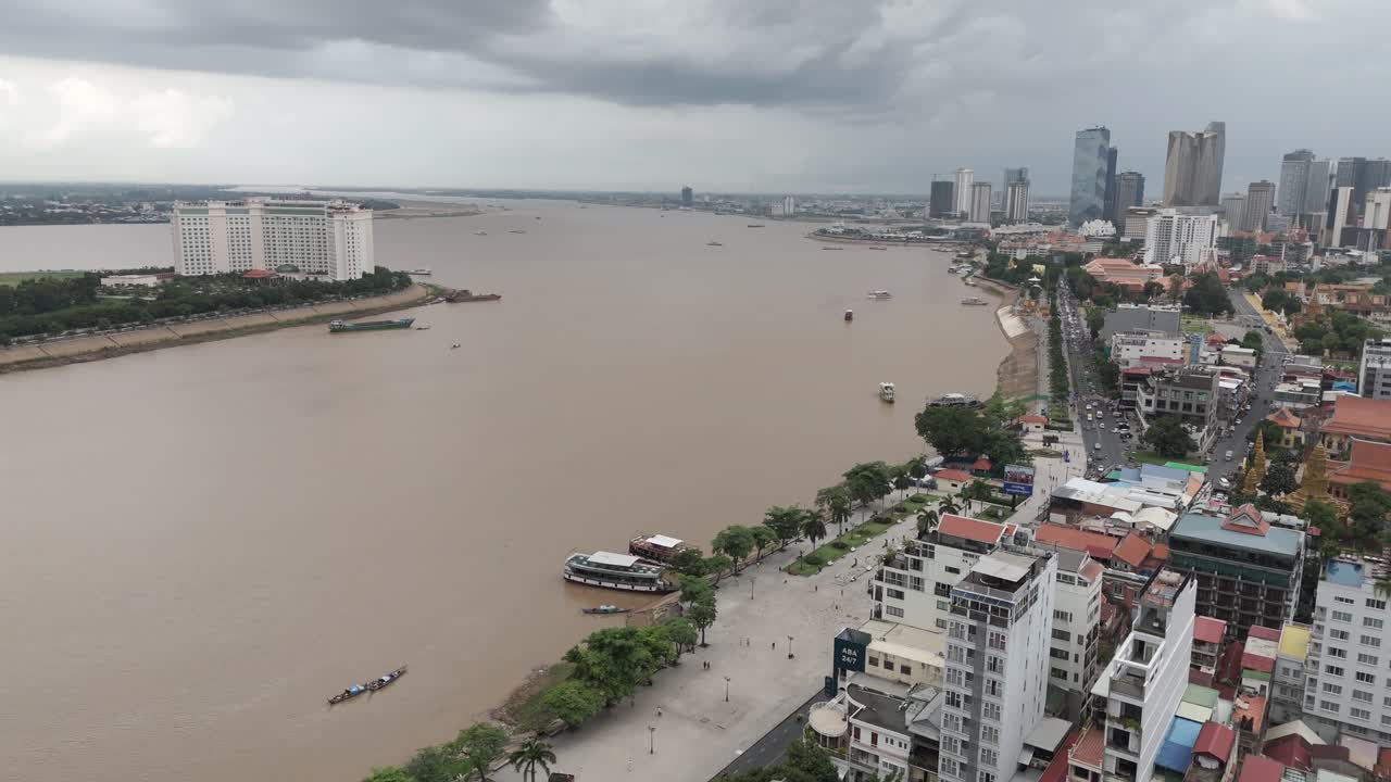 Aerial footage in Phnom Penh city center, Cambodia. Camera foward above the old city on the way to the Tonle sap river 2-2