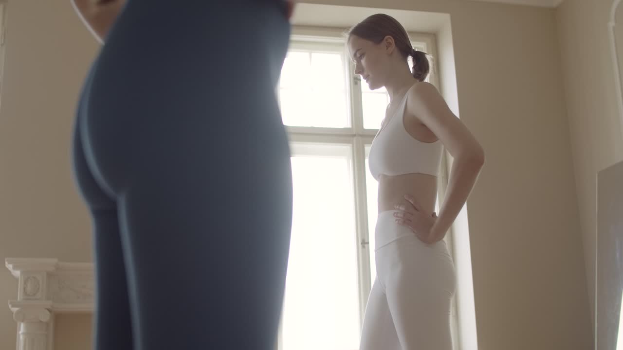Woman doing yoga or exercise in a room