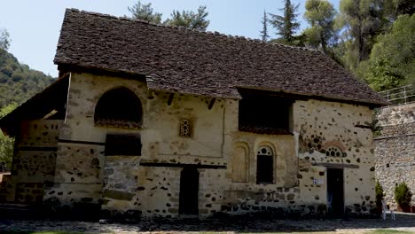 nestled in serene mountains, this ancient stone structure features intricate arches and rustic charm, inviting exploration of its rich history and cultural significance