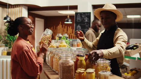 african american farmer recommends products for regular buyer