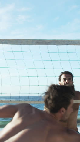 friends playing beach volleyball