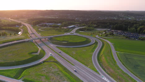 High-angle-aerial-at-sunset-of-highway-S6-in-Kielno,-Gdynia,-Poland