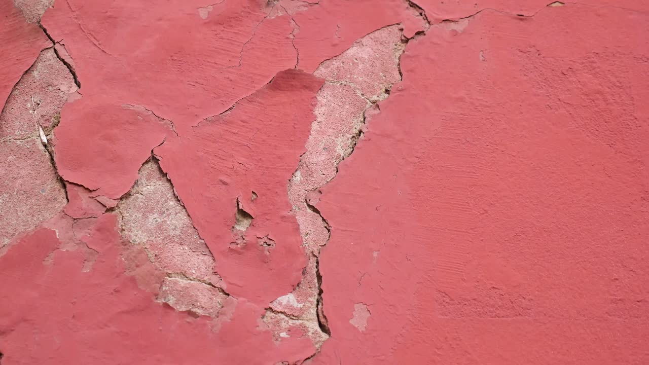 Peeling Red Paint on Wall