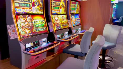 empty casino with colorful slot machines