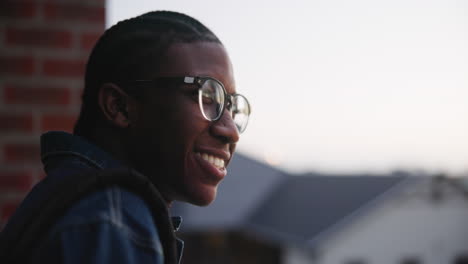 portrait of a young man wearing glasses