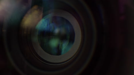 macro shot of the iris of a cinema lens opening and closing