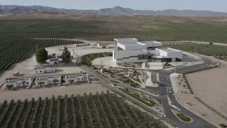 Close-up-over-buildings-in-Almeria's-race-track-surrounded-by-olive-fields