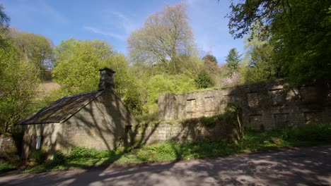 extra wide shot of the smithy and lower bleaching mill at lumsdale waterfalls, matlock