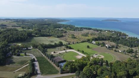 old mission peninsula with farms and buildings, aerial drone panoramic view