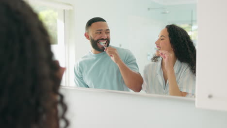 African-couple,-brushing-teeth-in-mirror-together