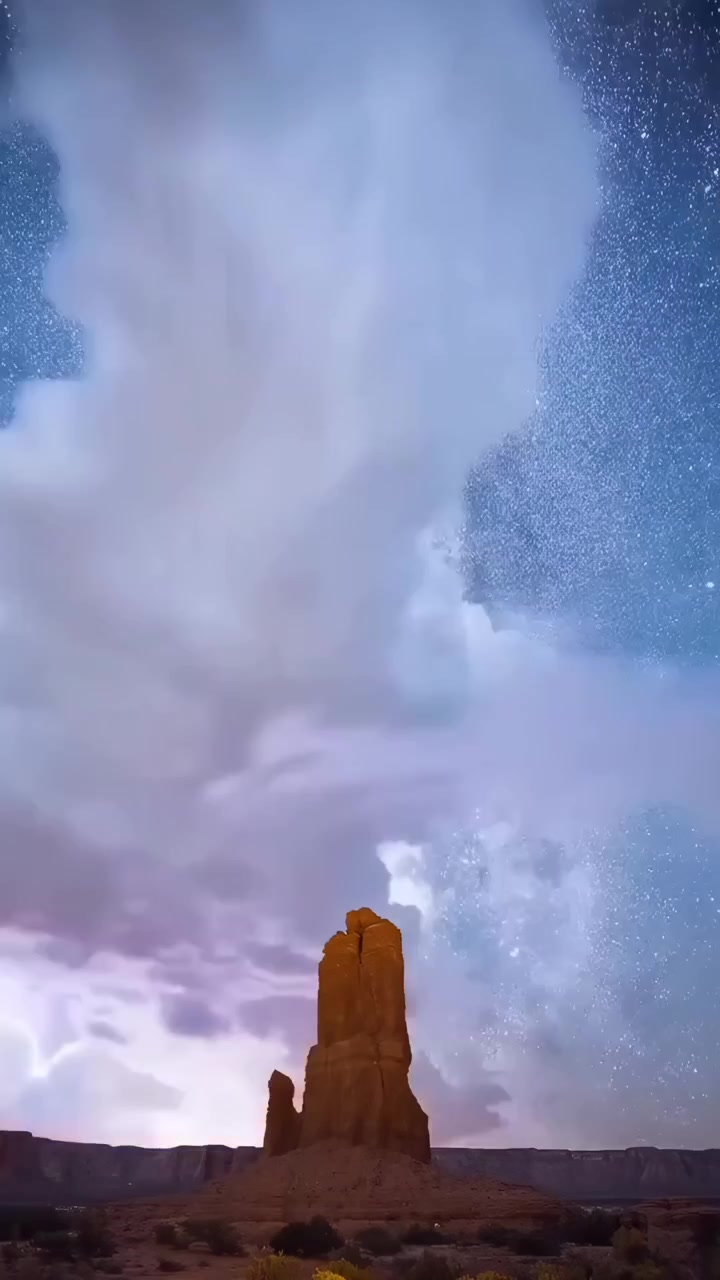 Milky Way and Lightning Over Desert Rock Formation Time-Lapse