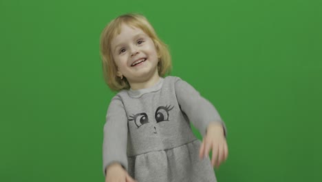 Kid-girl-on-a-Green-Screen,-Chroma-Key.-Happy-three-years-old-girl