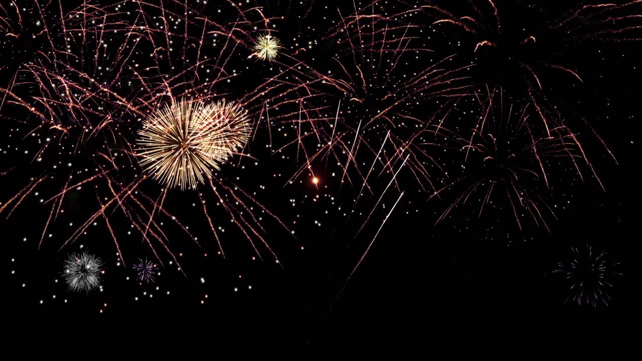 Colorful fireworks lights sky with bokeh background with copy space for new year celebration