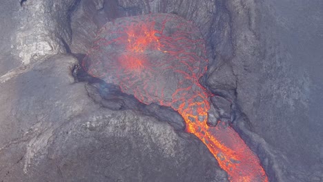 High-Drone-Birds-Eye-View-Aerial-Of-The-Fagradalsfjall-Volcano-Volcanic-Explosive-Eruption-Lava-Begins-To-Flow-On-The-Reykjanes-Peninsula-In-Iceland