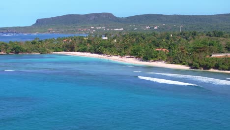 blue sea with playa la playita beach in background, las galeras landscape in samana peninsula, dominican republic