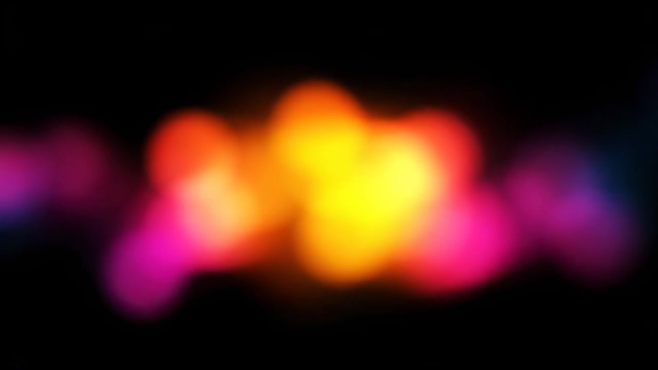 Abstract Background with Soft Glowing Orange and Pink Bokeh Lights