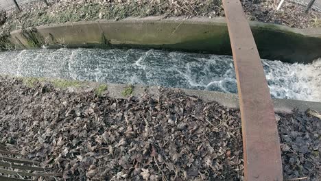 slow motion river overflow trench channel water overflowing dam narrow feed