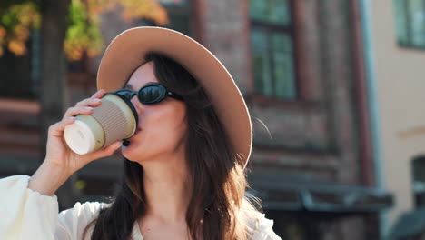 woman enjoying coffee outdoors