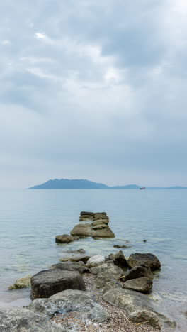 wild beach in greece in vertical