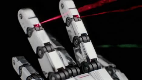 innovative robotic hand demonstrates precision with laser emission, showcasing advanced technology in mechanical design and functionality for future applications