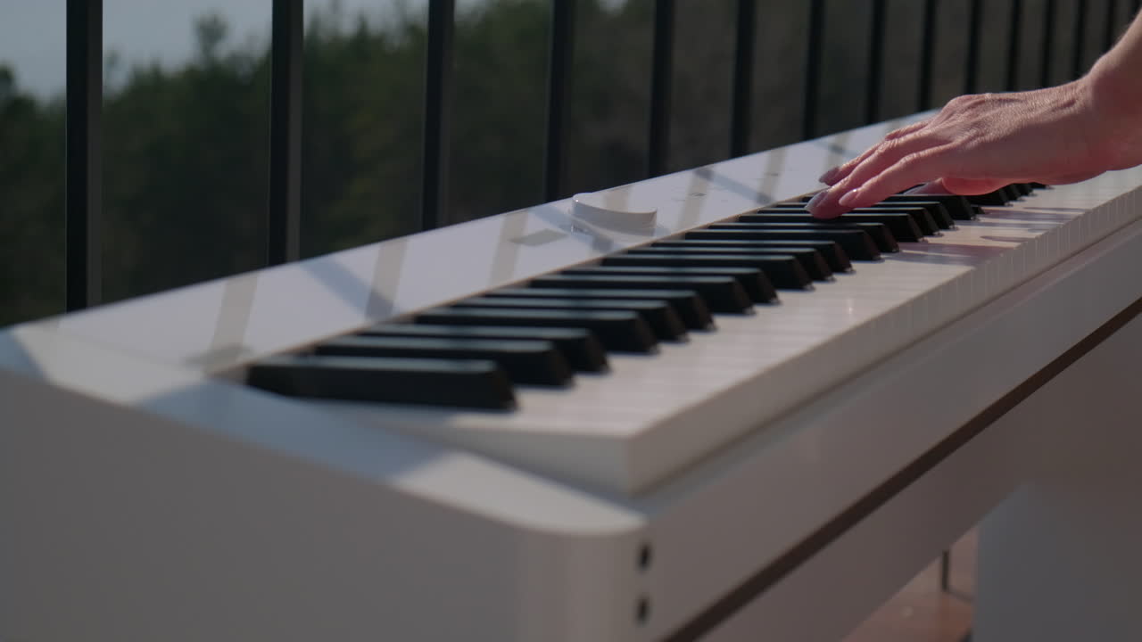 Playing Piano on a Balcony