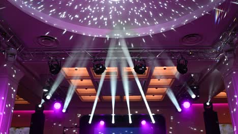 disco ball, view from below, from the disco ball beams, stage light, mirror ball