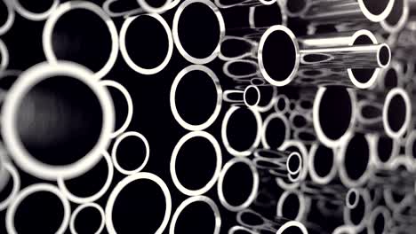 metal pipes stacked. heap of shiny metal steel pipes with selective focus effect.