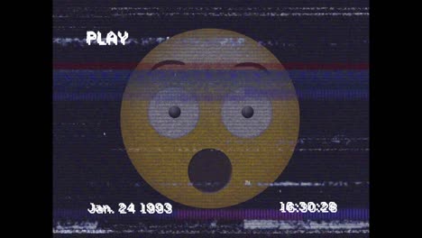 Digitale-Animation-Des-VHS-Glitch-Effekts-über-überraschtem-Gesichts-Emoji-Vor-Schwarzem-Hintergrund