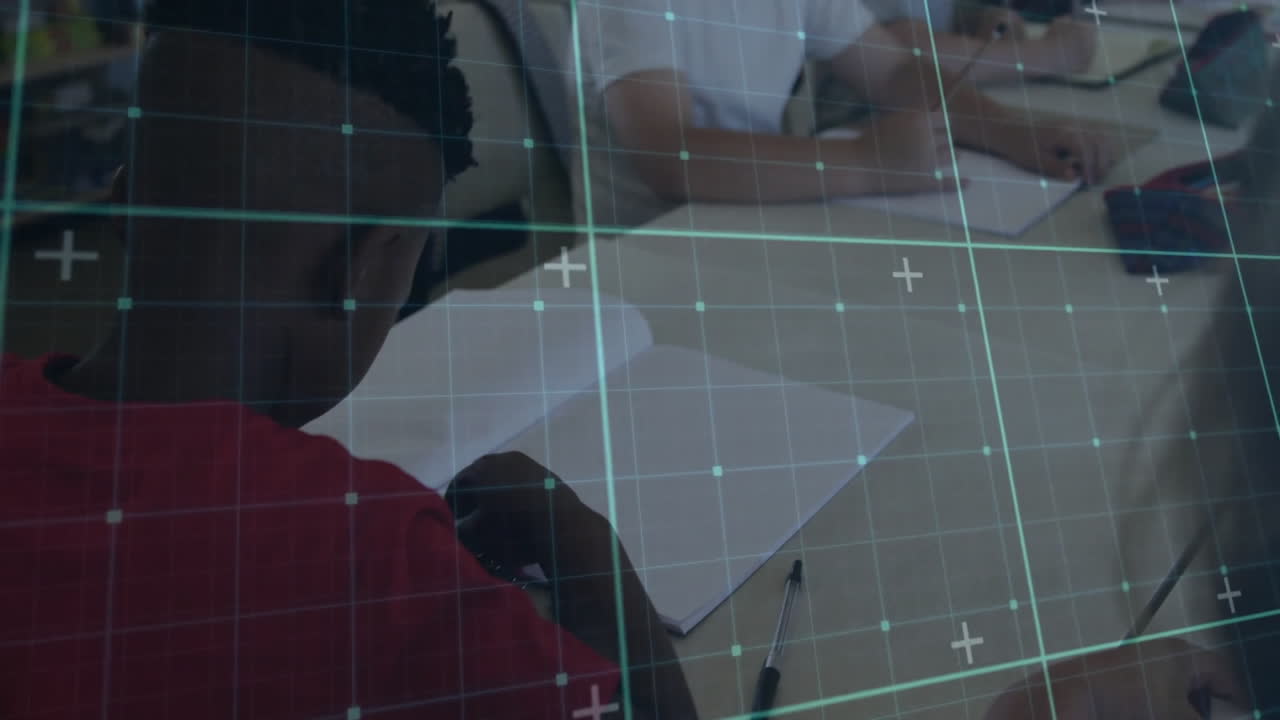 Student group writing on paper at classroom desk, showing education tech with digital grid overlay