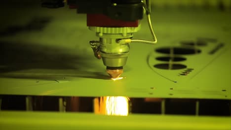 CNC-Laser-cutting-of-metal-in-slow-motion,-modern-industrial-technology.