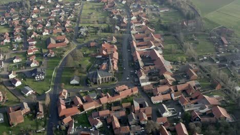 drone aerial of the typical german village seeburg located at the seeburger see on a beautiful sunday morning