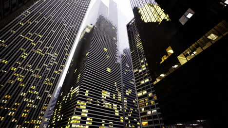 modern skyscrapers reflect evening light in an urban financial district