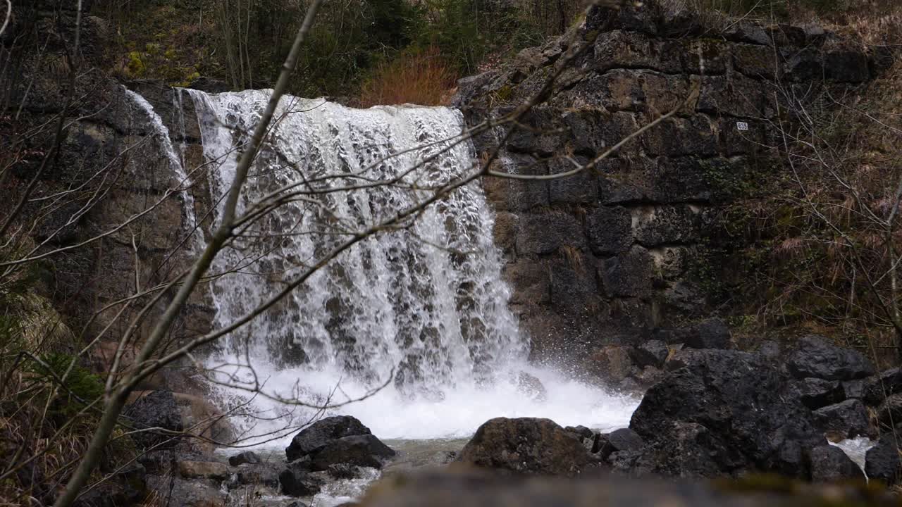 Slow Motion View of Bilten Waterfall in Switzerland Wilderness