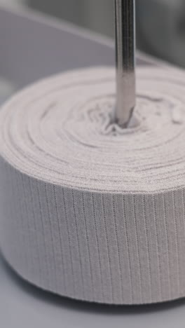 rolled fabric or paper